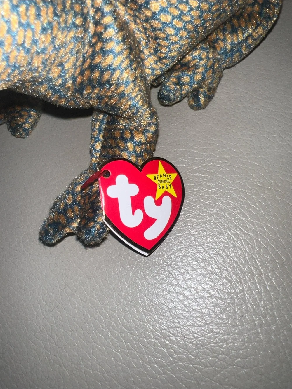 TY Beanie Babies Scaly the lizard with blue and gold speckled pattern